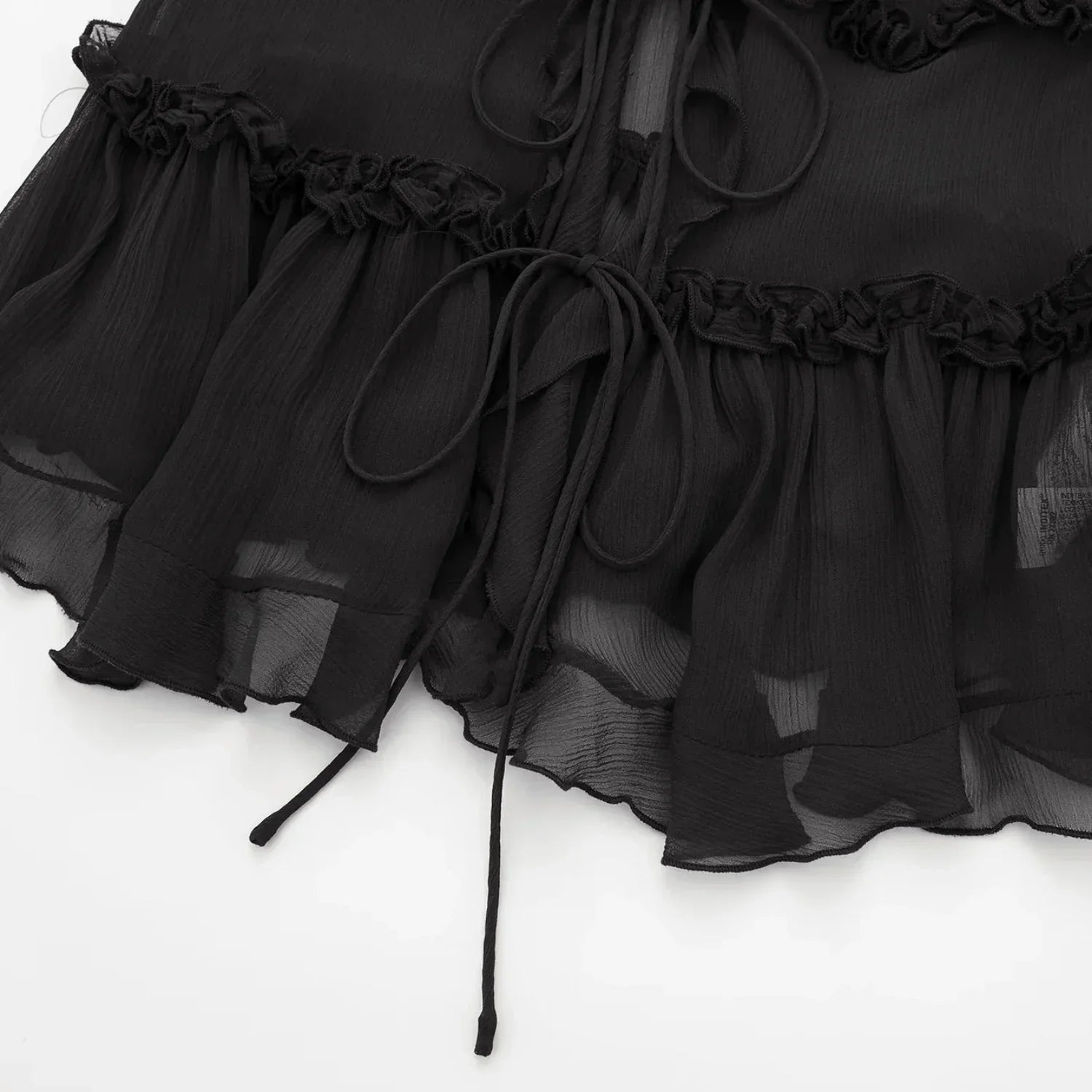 Melany – Playful Ruffle Top